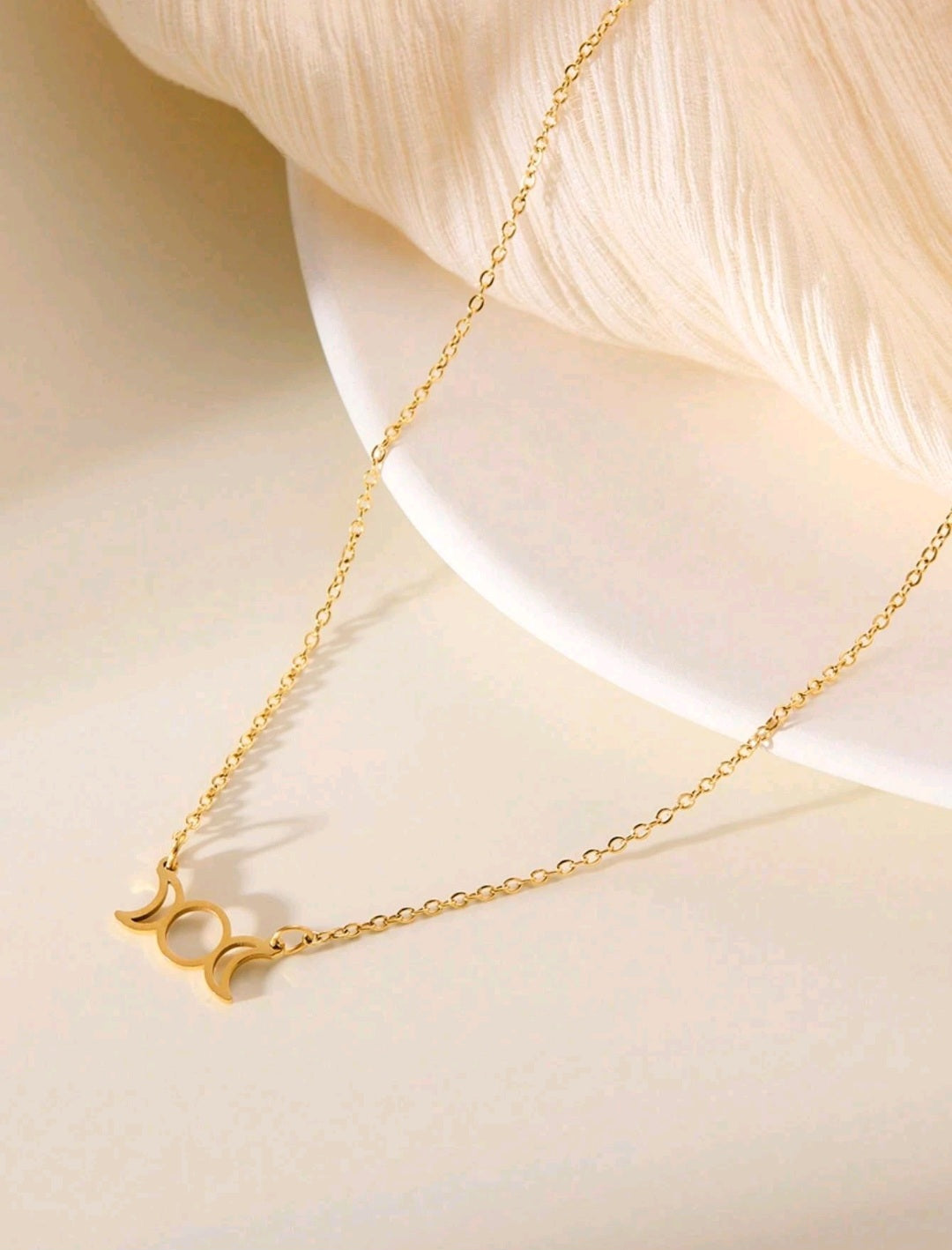 Pendentif triple lune