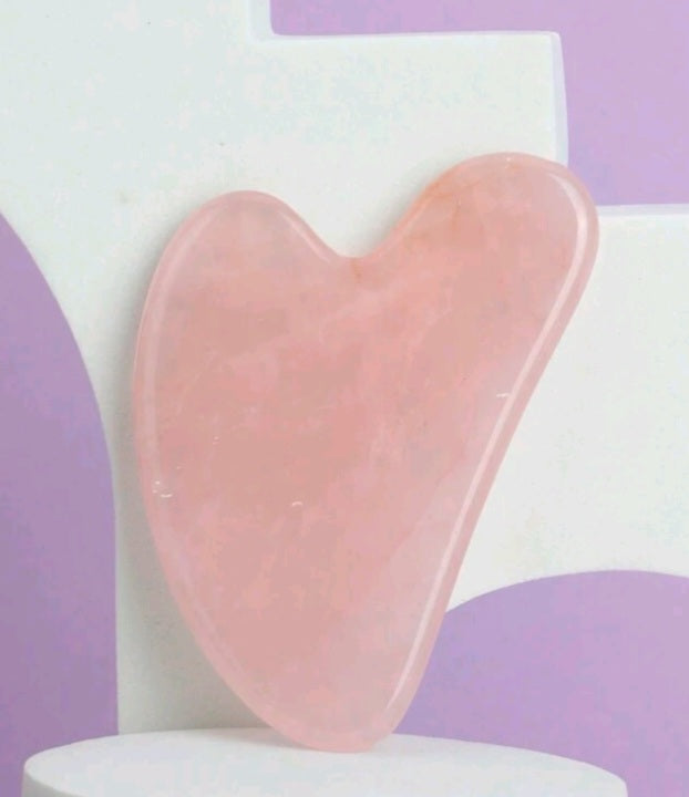 masseur facial en quartz rose