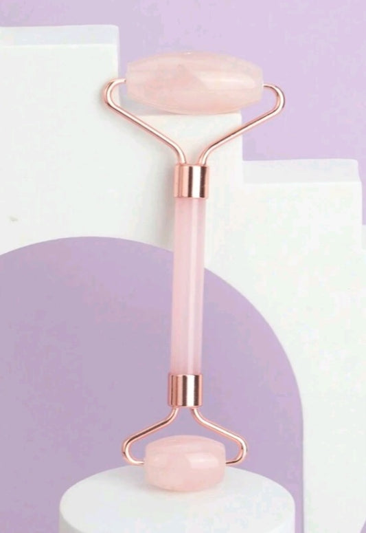 masseur facial en quartz rose