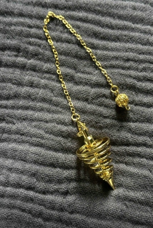 pendule spirale en laiton
